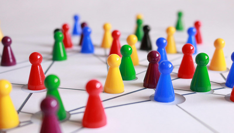 board game pieces networking with one another