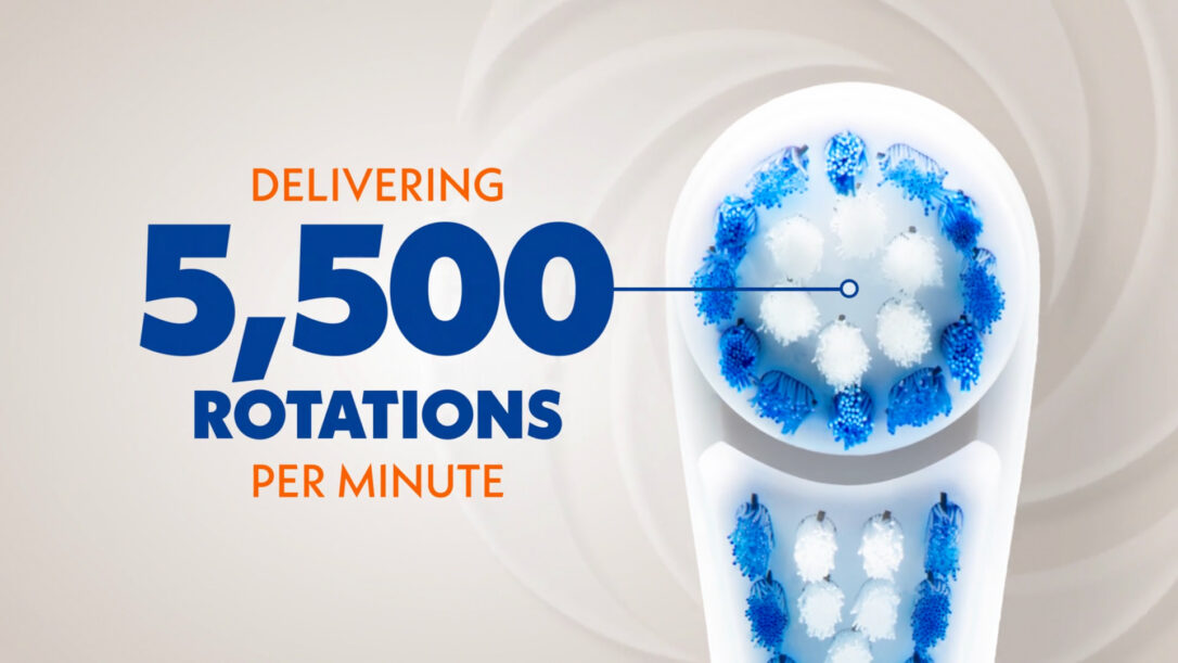 Spinbrush brush head with onscreen text "Delivering 5,500 rotations per minute"